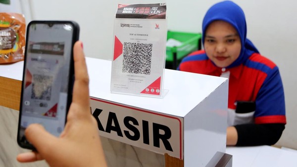 Bank Indonesia - BI Tegaskan Bayar Pakai QRIS Tak Kena PPN 12%!